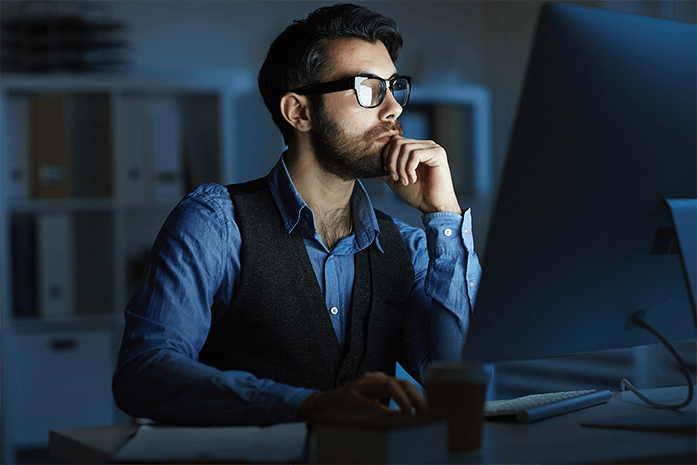 Professional in blue shirt and vest